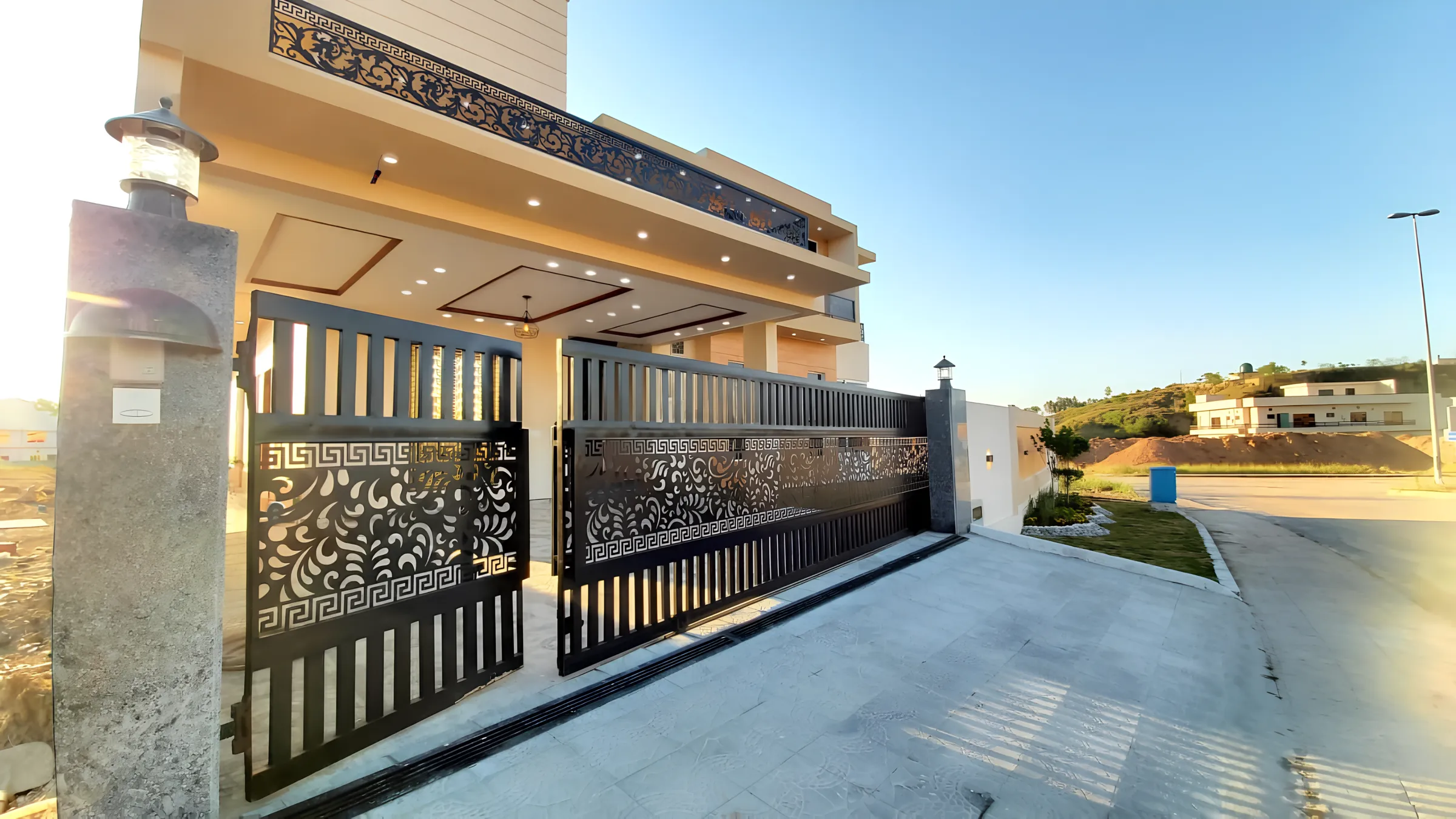 Afaq Associates residence entrance with laser-cut gate
